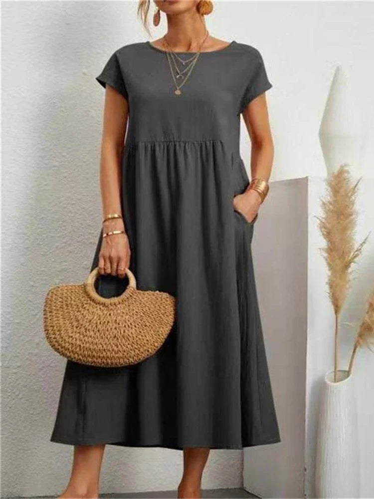 Cordelia Ashvale | White Pocketed Midi Dress with Round Neck