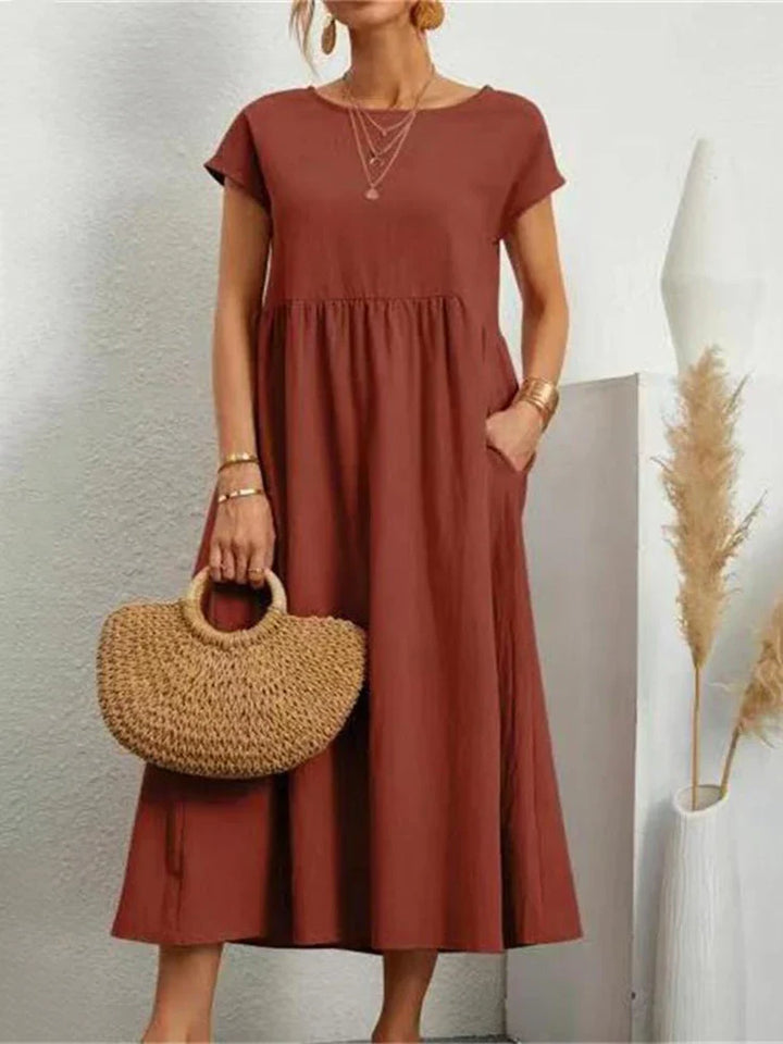 Cordelia Ashvale | White Pocketed Midi Dress with Round Neck