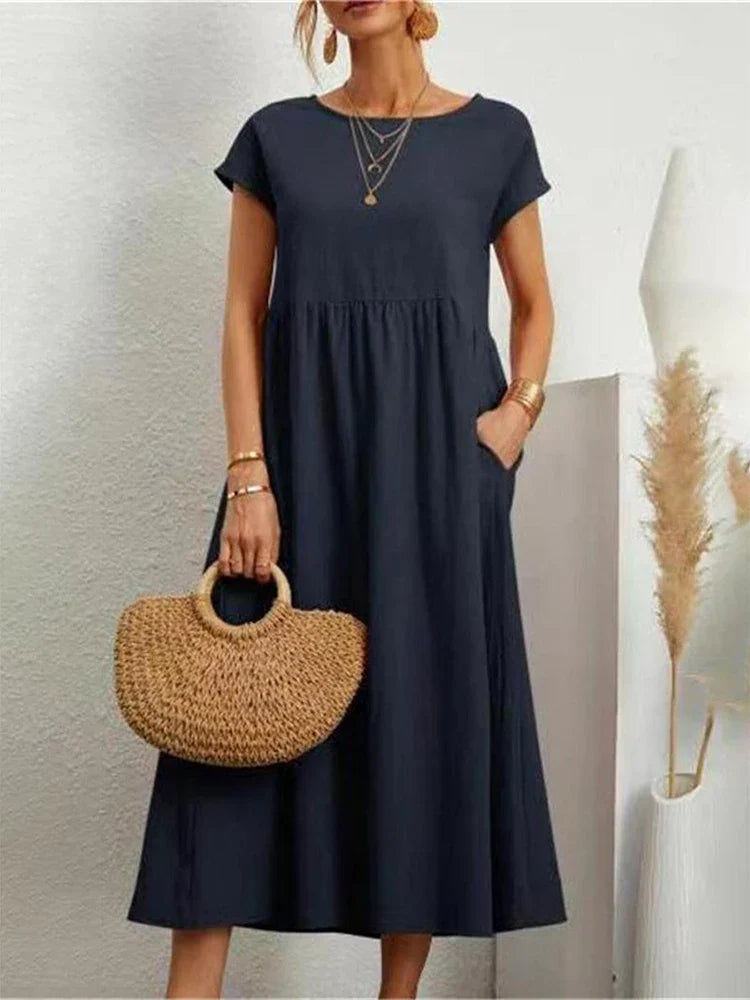 Cordelia Ashvale | White Pocketed Midi Dress with Round Neck